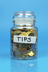 tips jar filled with coins
