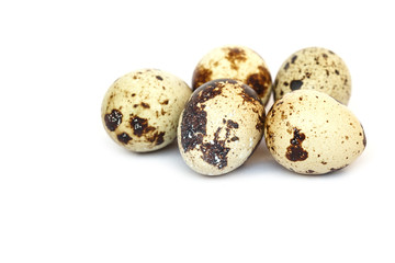 Quail eggs isolated on white ground