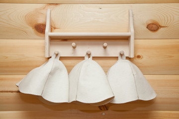 Obraz na płótnie Canvas Hats for sauna and bath