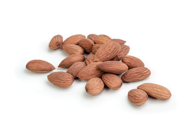 Heap of almond nuts isolated on white background