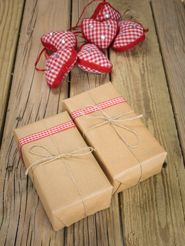 parcels wrapped in brown paper and string with red check decorat