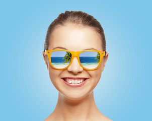 happy teenage girl in sunglasses