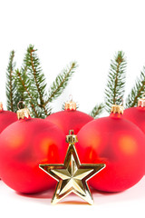 Fototapeta na wymiar red Christmas balls and fir branch