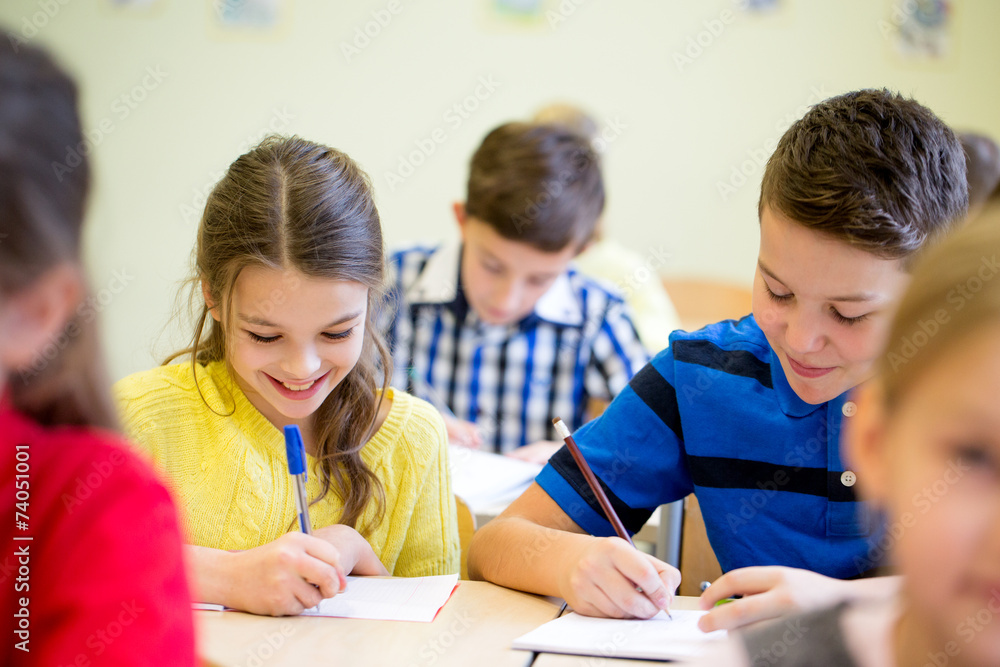 Sticker group of school kids writing test in classroom