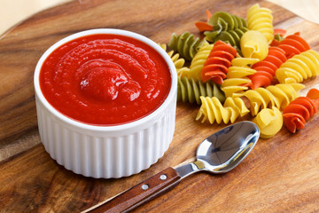 Tomato sauce with italian pasta and spoon