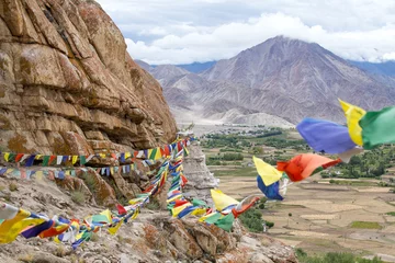 Foto op Plexiglas Buddhist prayer flags near Buddhist monastery in Ladakh, India © OlegD