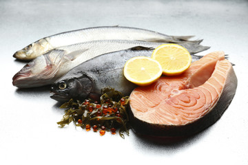 Fresh fish with lemon close-up