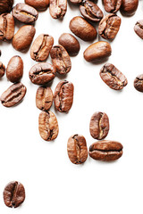 Coffee beans on white table, close-up