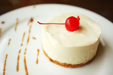 Tasty cake on plate in cafe