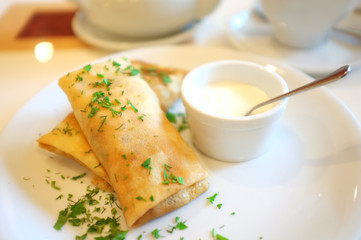 Tasty pancakes on plate in cafe