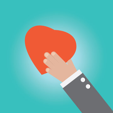 Vector of businessman hand holding heart