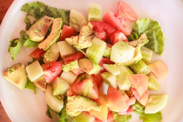 fresh vegetables salad made from tomatoes and cucumber close up