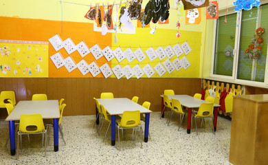 benches and small yellow chairs in a nursery for children