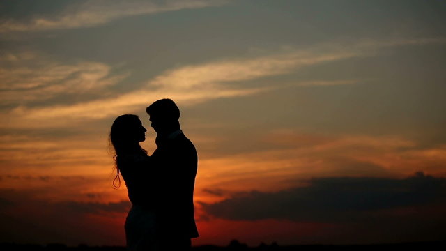lovers at sunset