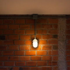 Old brick wall with industrial light