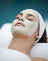 spa, resort, beauty and health concept - beautiful woman in spa 