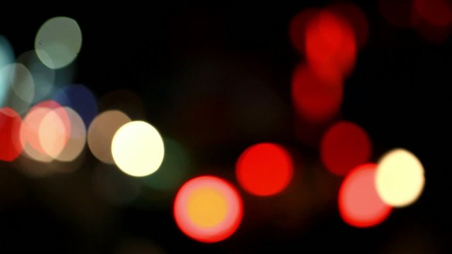 Cityscape bokeh night background on the road. HD. 1920x1080