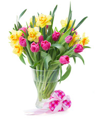 bunch of  tulips and daffodils in vase