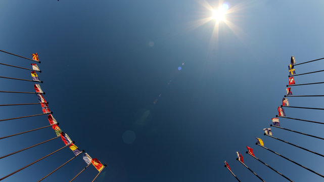 international flags against the sky
