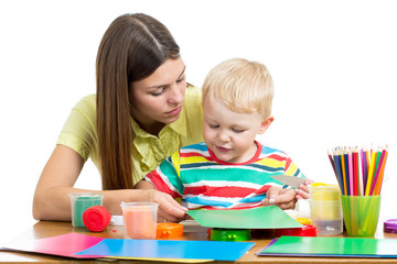 Mother and kid boy play together