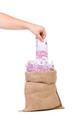 hand with money bag