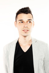 Fashion guy portrait with jacket on white background