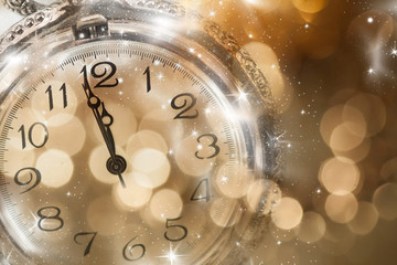 New Year's at midnight - Old clock and holiday lights