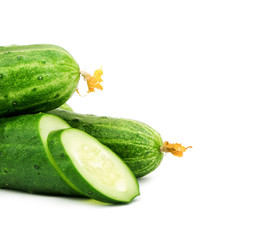 Cucumber and slices isolated over white background