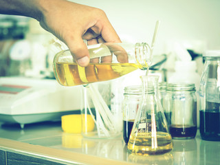 flask in scientist hand