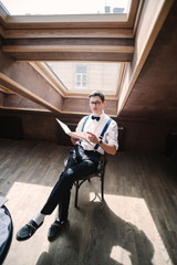 Man reading a book during coffee break.