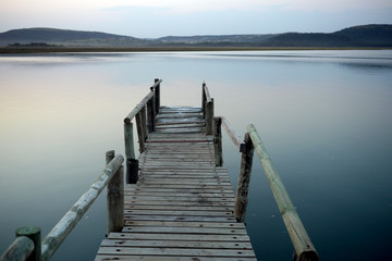 jetty leading into a tranquil river