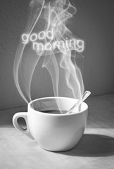 Hot steamy coffee with good morning text