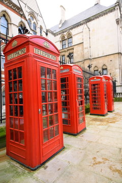 Row of public red telephone boxes in London