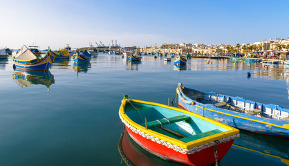 Fototapeta na wymiar Pair of small Colored fishing boats, Malta
