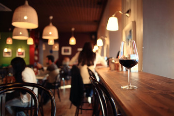 glass with red wine, tasting, restaurant