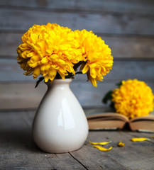 Flowers. Beautiful yellow chrysanthemum in a vintage vase.