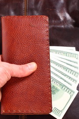 Leather wallet,inside, with  dollars