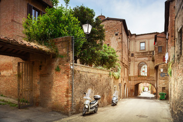 Small town street view in Sienna, Italy