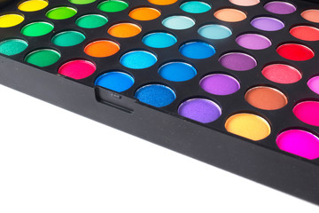 Palette of colorful eye shadows isolated on white background