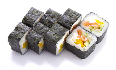 Sushi roll in nori with salmon cheese and vegetables isolated