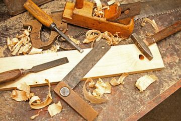 old vintage construction tools on the workbench