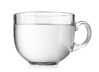 Transparent glass tea cup isolated on white background