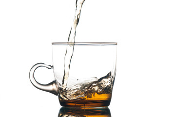 Tea pouring to the glass