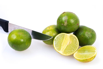 Limes on the white background