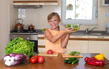 Young Girl Cooking. Healthy Food - Vegetable Salad. Diet.