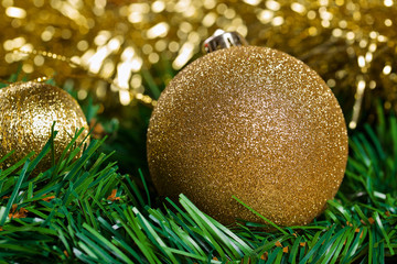 Christmas balls with green fir-tree branch