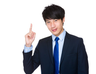 Businessman with finger point up