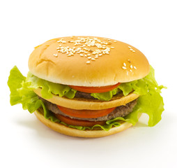 Big and tasty hamburger isolated on white background