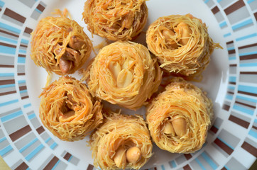 Closeup of birds nest baklava dessert with peanuts