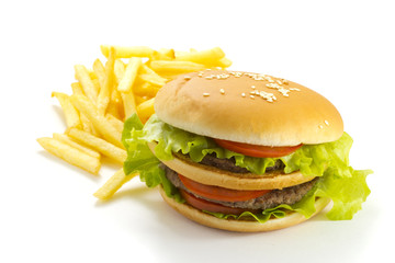 Big and tasty hamburger and fried potatoes isolated 